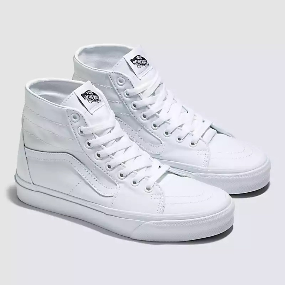 White,  high top Vans size 6. Never worn.